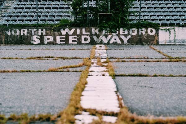 Today grass grows through the North Wilkesboro Speedway Today grass grows through the North Wilkesboro Speedway